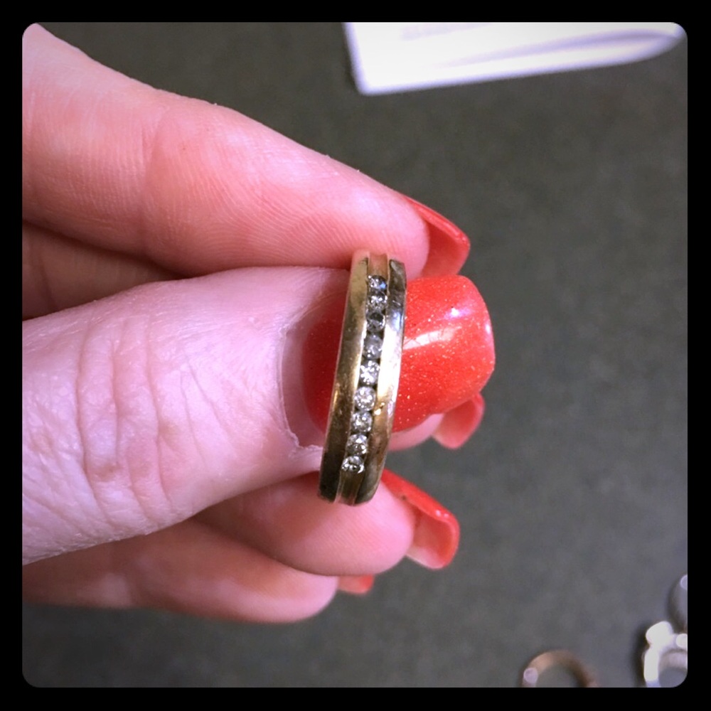 10k solid gold with 9 real diamonds channel set